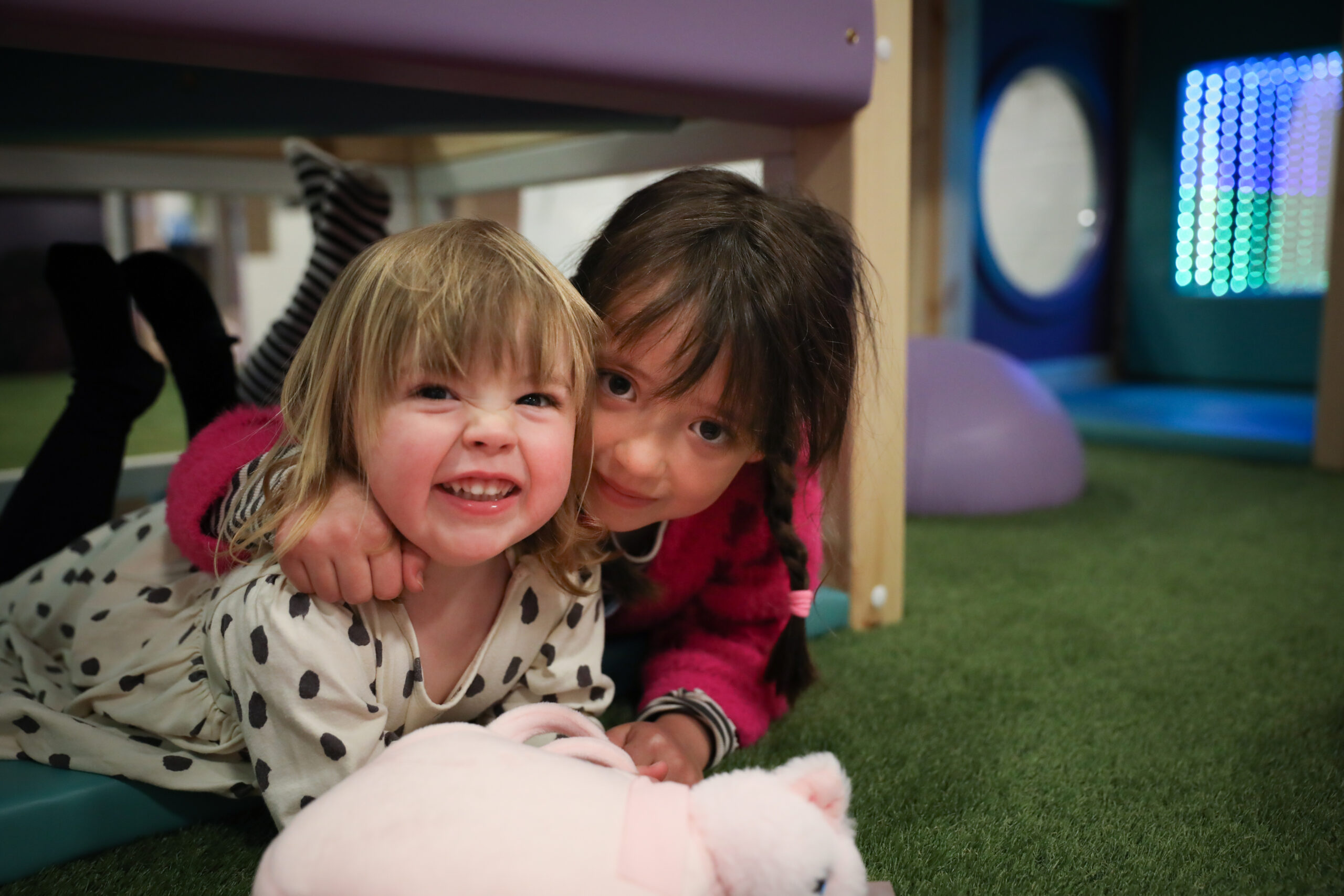 Family enjoying a relaxed visit to Small+Mighty soft play, Godalming