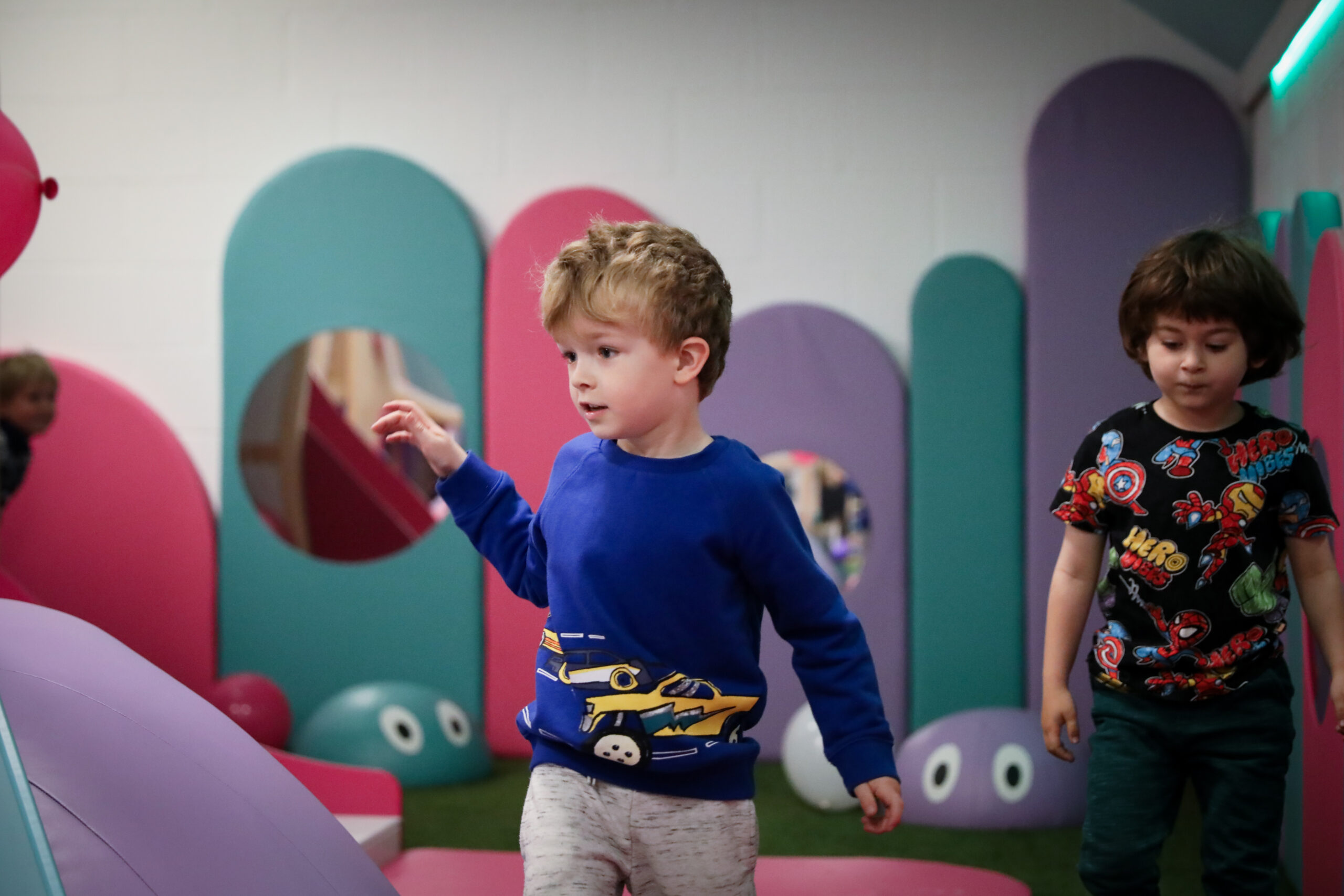 Child enjoying imaginative role play at Small+Mighty, Godalming