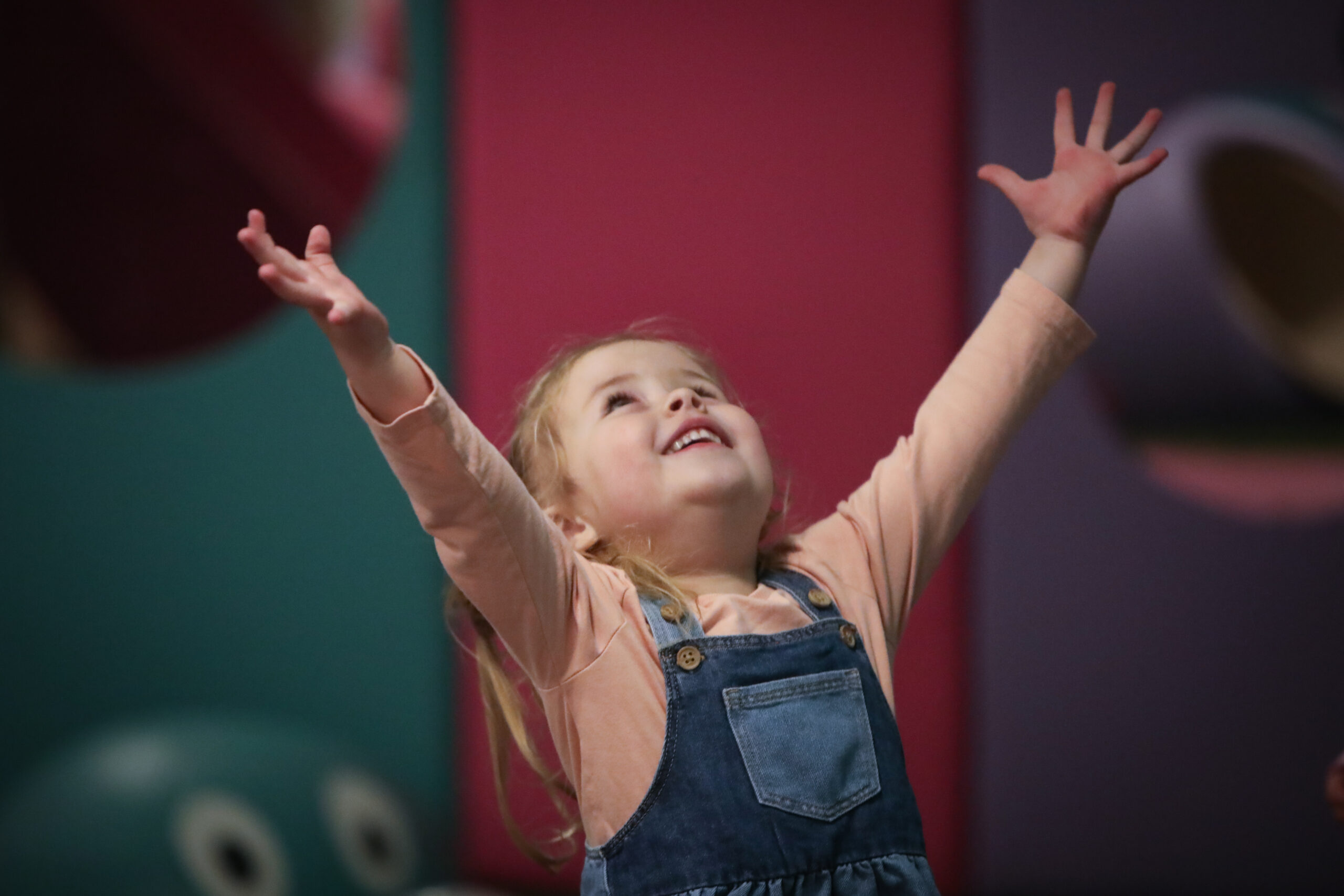 Child enjoying imaginative role play at Small+Mighty, Godalming