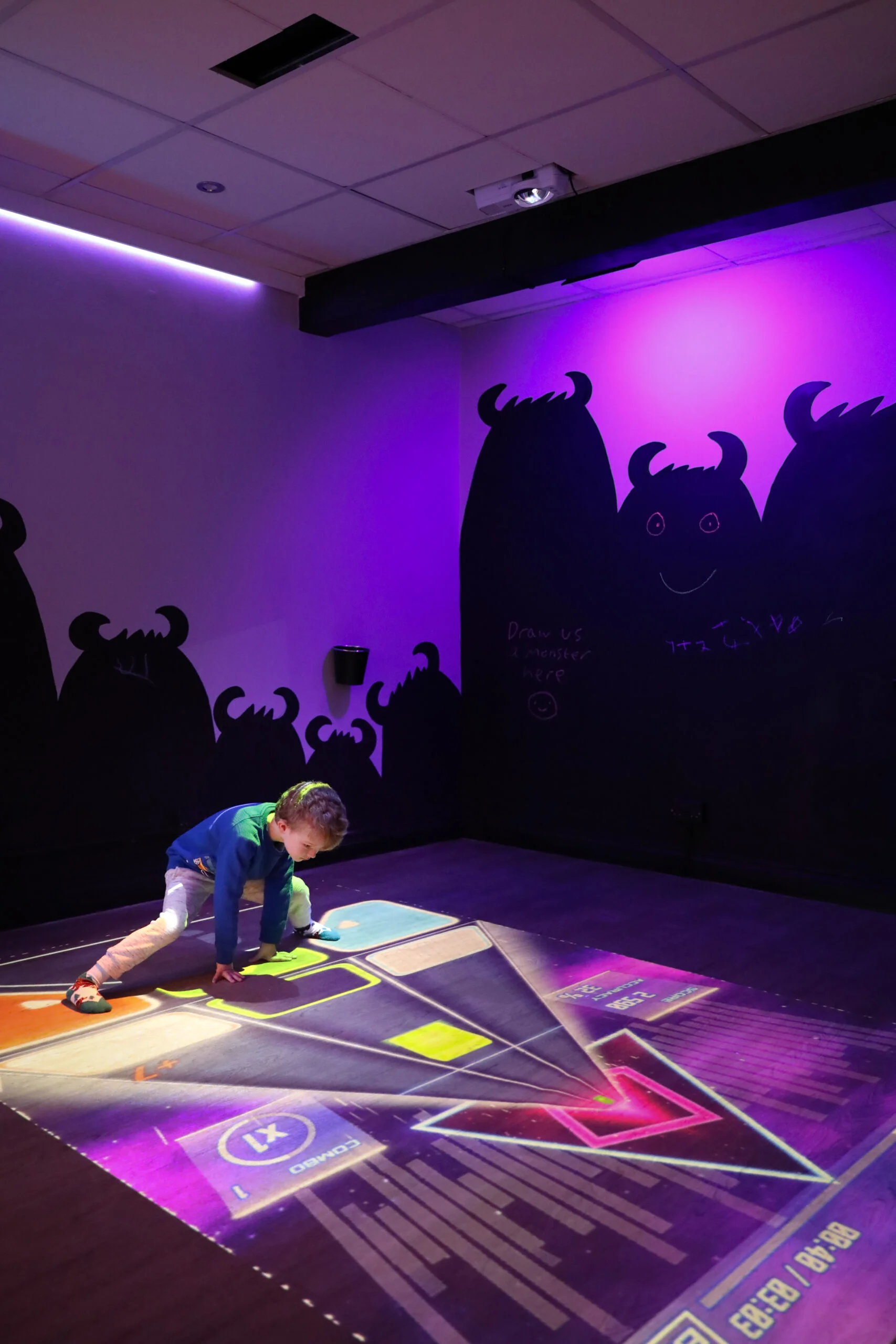 Interactive digital floor games at Small+Mighty play cafe